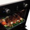 Horno Challenger HG2560 con bandeja de carnes y vegetales asándose