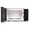 Horno microondas Whirlpool 45 litros negro con puerta abierta e interior amplio
