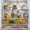 Nevecón Whirlpool French Door 861 L abierto con alimentos frescos organizados